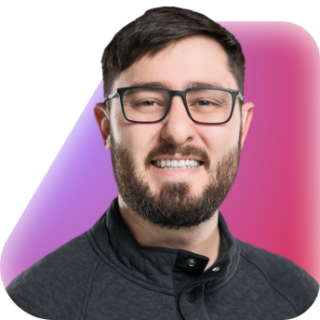 headshot of Tom Emola